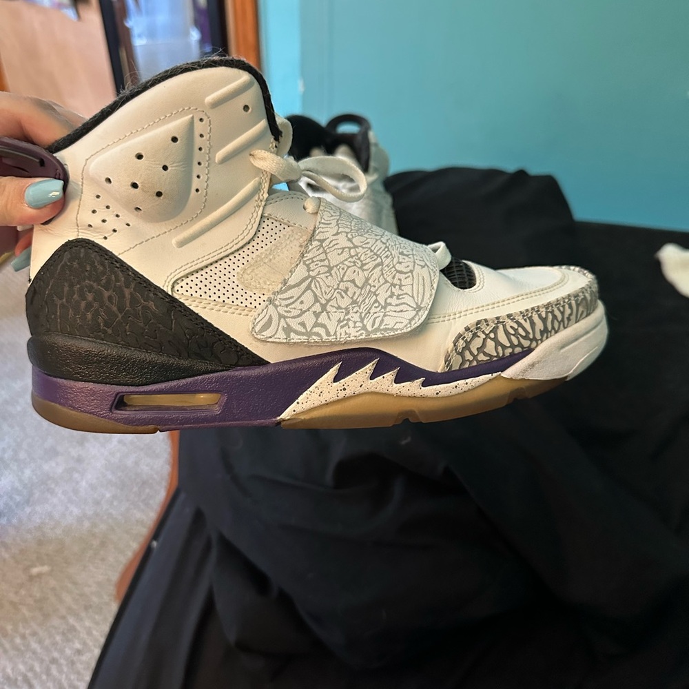 Air Jordan’s White and Purple Patterned High-Top Sneakers